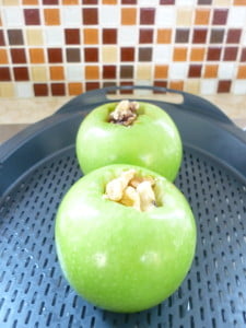 Baked apples stuffed with dates, walnuts, soaked raisins and cinnamon. So easy to make. Stuff them and bake them for 20 minutes - scrumptious!